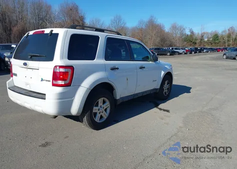 2011 Ford Escape Hybrid from USA, damaged, VIN 1FMCU5K34BKA69461